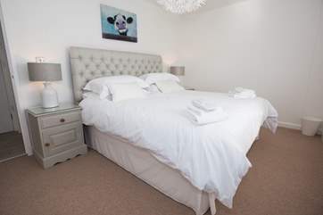 A 6' double bed with White Company linen.