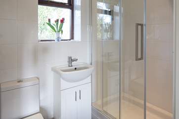 The en suite shower-room has a large shower with a small step up into it.