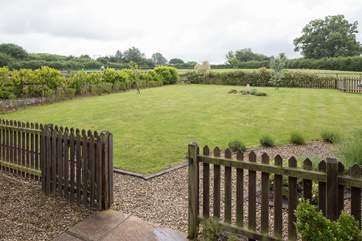 The fully enclosed garden is the perfect place to relax and listen to the birds.