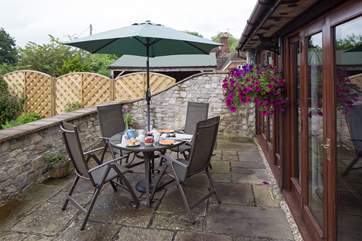 The south facing patio is perfect for afternoon tea.