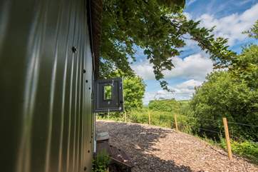 The hut enjoys lovely countryside views.