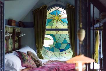 Wow, what a window, designed by the owner and bespoke made.