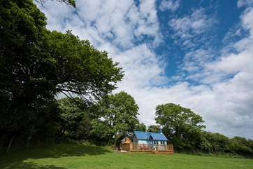 Sat in a lovely position with the most fabulous views over open countryside to the coast in the distance.