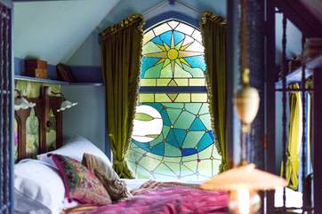 Wow, what a window, designed by the owner and bespoke made.