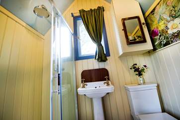The en suite shower-room has a drench head shower.