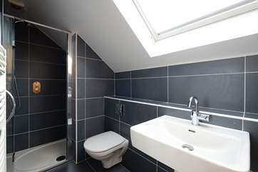 The en suite shower-room to Bedroom 3.