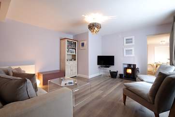 The lovely wood-burner warms the sitting/dining-room.
