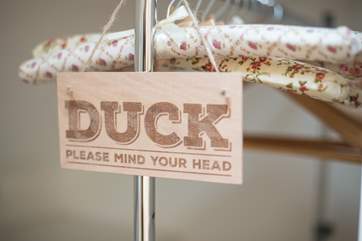 The bedroom has sloping ceilings so this is a little reminder to take care!