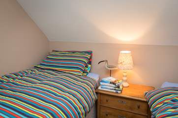 This is the twin bedroom - also with characterful sloping ceilings but plenty of space too.