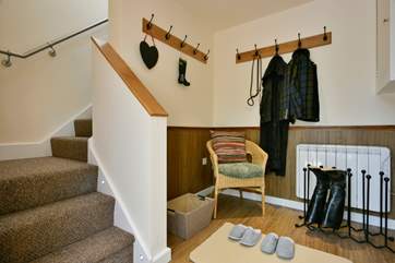 This is the ground floor entrance hallway - the thoughtful touch of slippers is a sign of the attention to detail here.