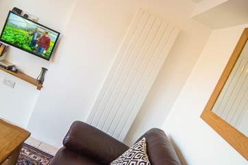 The floor-to-ceiling radiator ensures plenty of warmth whatever the weather.