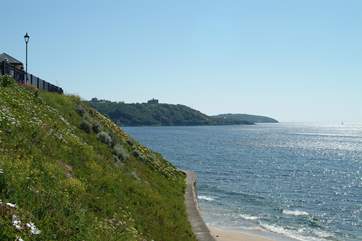 Pendennis Castle sits on the headland, seen here from Gyllyngvase beach.