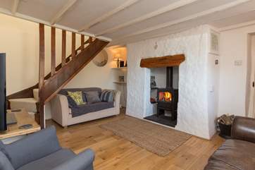 The sitting-room has a wood-burner so this cottage is a great place to stay whatever the time of year.
