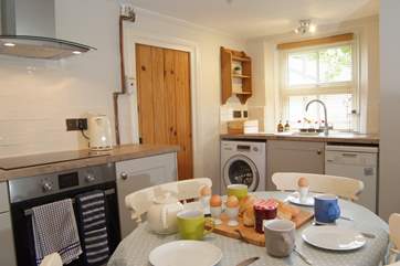 The downstairs shower room is off the kitchen - there is a family bathroom upstairs as well.