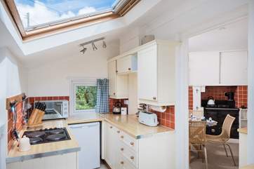 The kitchen has a hob, microwave and table-top mini-oven, plus the Rayburn is lit and available to cook on from October to Easter.