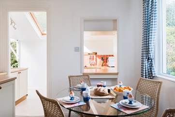 Looking through to the kitchen and back door which will take you to the enclosed rear courtyard, ideal for the four legged guests.