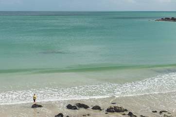 The clear waters at Coverack bay, the shallow waters at low tide make it safe for swimming or just a paddle.