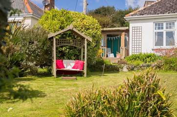 Looking up to the summer-house and garden seat from the front gate.