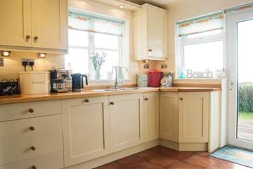 The kitchen shares the wonderful views.