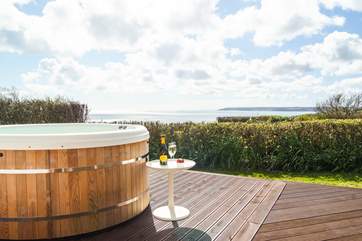 The hot tub has superb views out across Mount's Bay.
