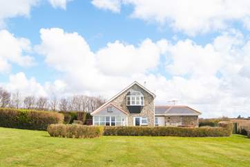 Sea Garden House is set within four acres of garden, paddock and woodland.