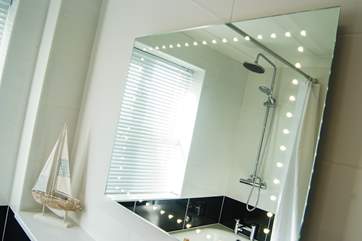 The mirror has LED lights.