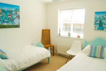 Bedroom 2 has twin beds.