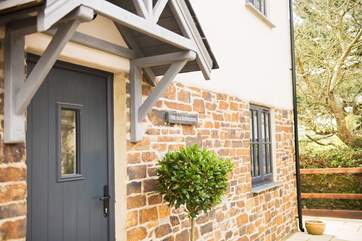 This super cottage was built on the site of the old sand school.
