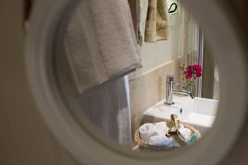 There is also a wash-basin and proper flushing toilet.