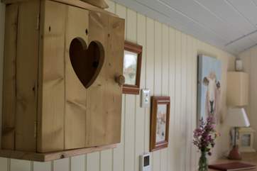 Pictures and pieces make this hut a very special holiday destination.