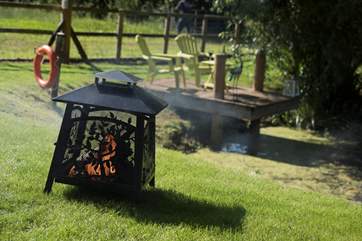 There is even a little firepit for evenings outside.