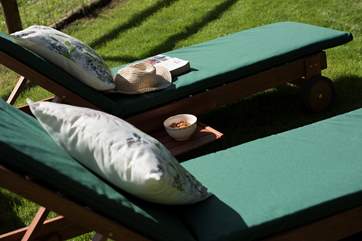 Sun loungers are provided.