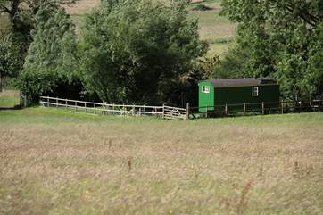 Looking down towards Lady's Wells Shepherd's Hut from the top of the field. Totally enclosed, your very own countryside haven.