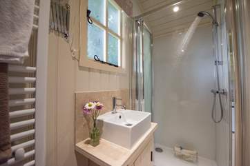 The en suite shower-room is beautifully fitted including a heated towel rail.