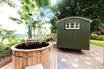 What a very special way to end the day with a soak in the wood-fired hot tub looking out at the countryside views.