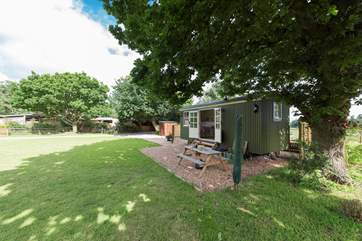 Set in a lovely setting with a lovely old tree for shade.
