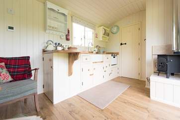 There is a cosy little wood-burner in the corner and underfloor heating too for the cooler months.