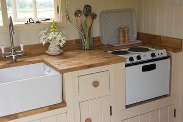The kitchen is extremely well equipped - with a mini oven and hob, toaster and kettle too.