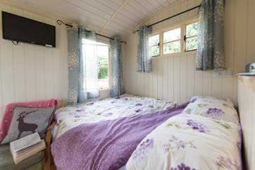 There is a picture window at the bottom of your bed and there is even a TV too!