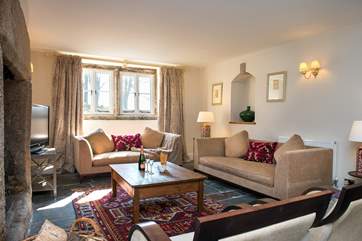 The main sitting-room is incredibly spacious and stylishly furnished.