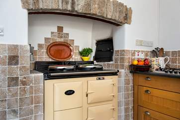The electric Aga in the kitchen will be a cook's delight.