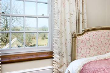 ...and enjoys the countryside views at the front of the house.