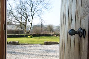 The front door leads out to the patio area and front lawn.