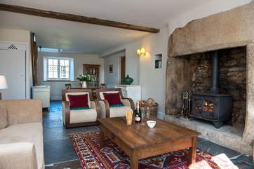 The main sitting-room with its warming wood-burner makes this an ideal retreat all year round.