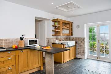 The double doors in the kitchen lead out to the patio-area.