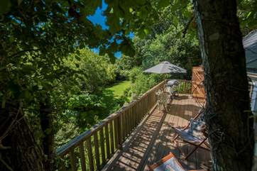 The wrap around deck has plenty of space to relax and enjoy the sounds of the countryside.