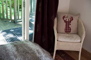 A little chair sits in the corner.