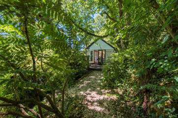 The pathway entrance to The Cabin at Wrinklers Wood.