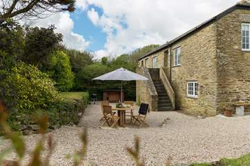 Carminowe View Cottage is a reverse level semi-detached stone cottage with its own enclosed private garden.