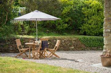 The enclosed patio and terraced garden can be a real sun-trap.